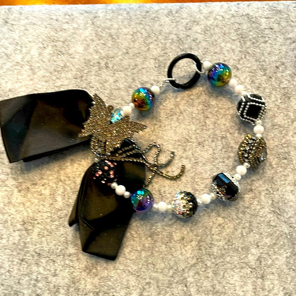 NEW Bling and Elegant phone wrist phone charm.